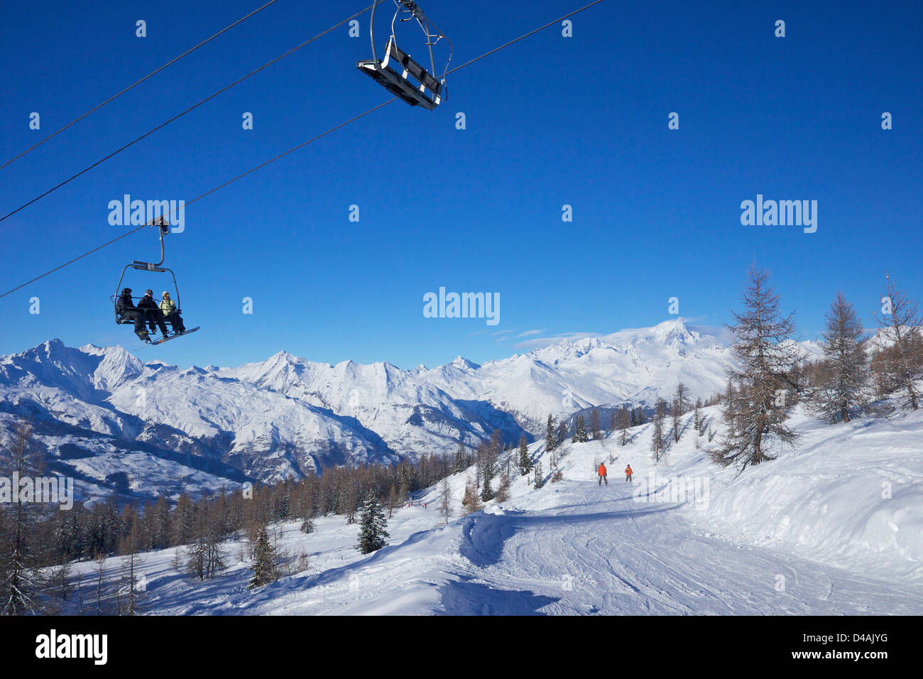 Vallandry chairlift with La Foret blue piste and Mont Blanc behind, Peisey-Vallandry, Les Arcs, Savoie, France, Europe Stock Photo