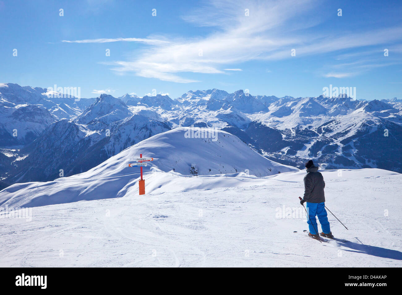 Skiers on Bozelet blue piste in winter sunshine, Verdons Sud, La Plagne, France, Europe Stock Photo