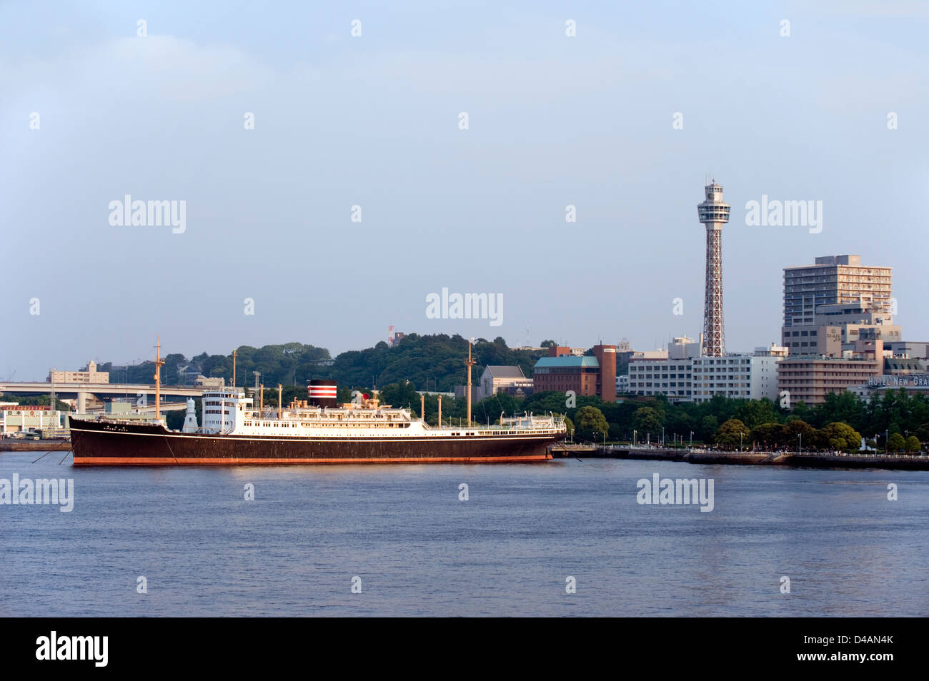 Nippon Yusen built the Hikawa Maru ocean liner moored at Yamashita Park near the Marine Tower on Yokohama's waterfront. Stock Photo