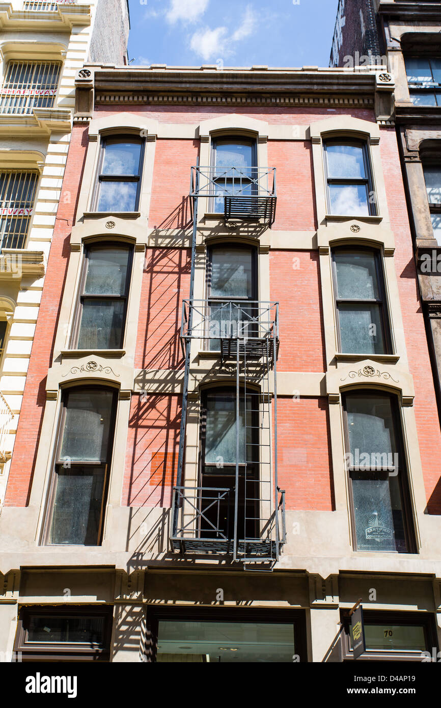 Fire escape ladders on the building in Manhattan Stock Photo - Alamy