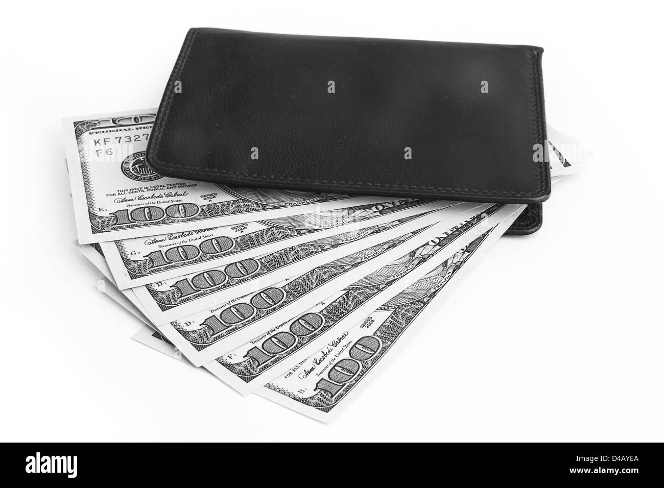 US dollars in a black wallet isolated on white Stock Photo