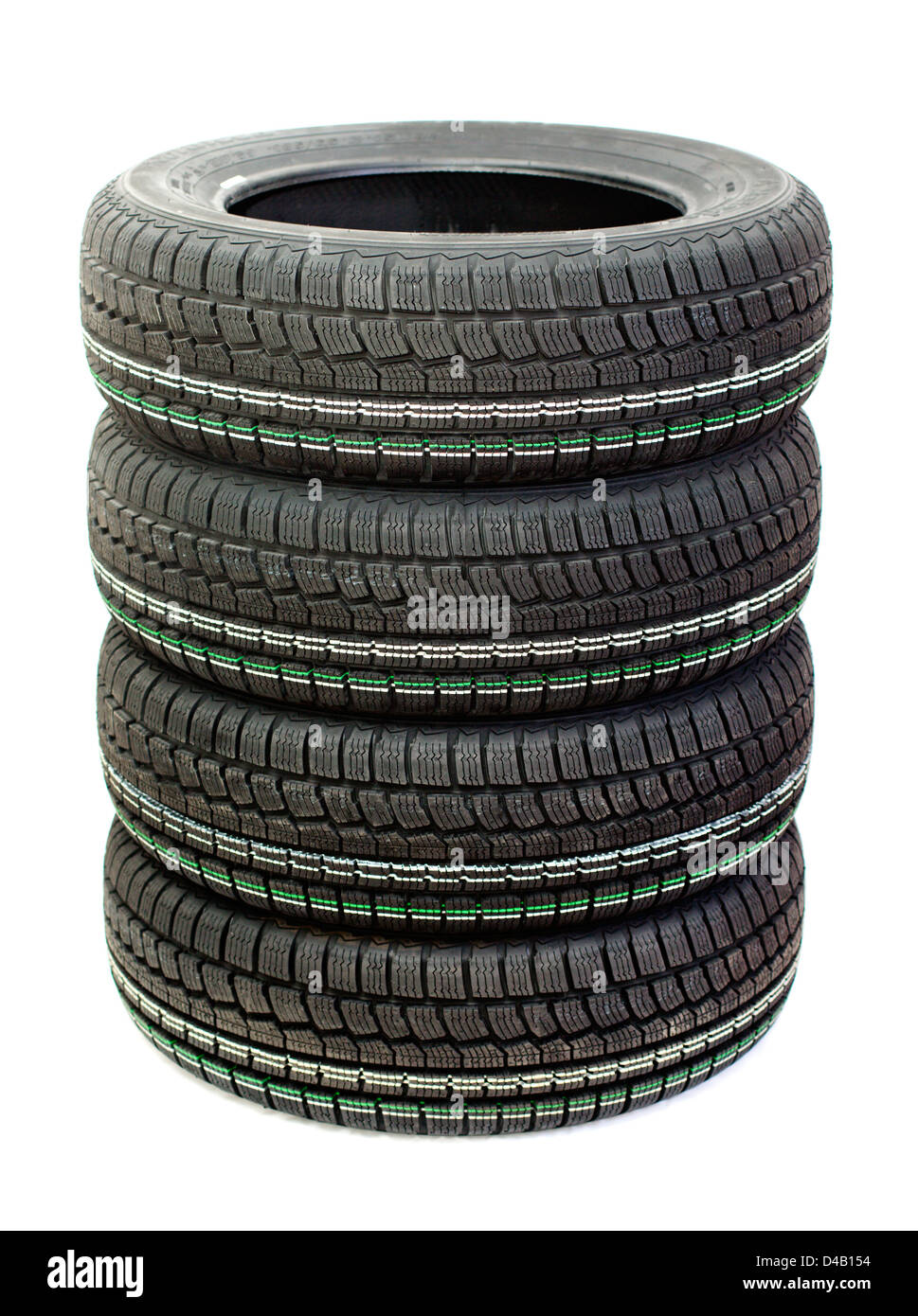 Four new tires stacked on white background Stock Photo