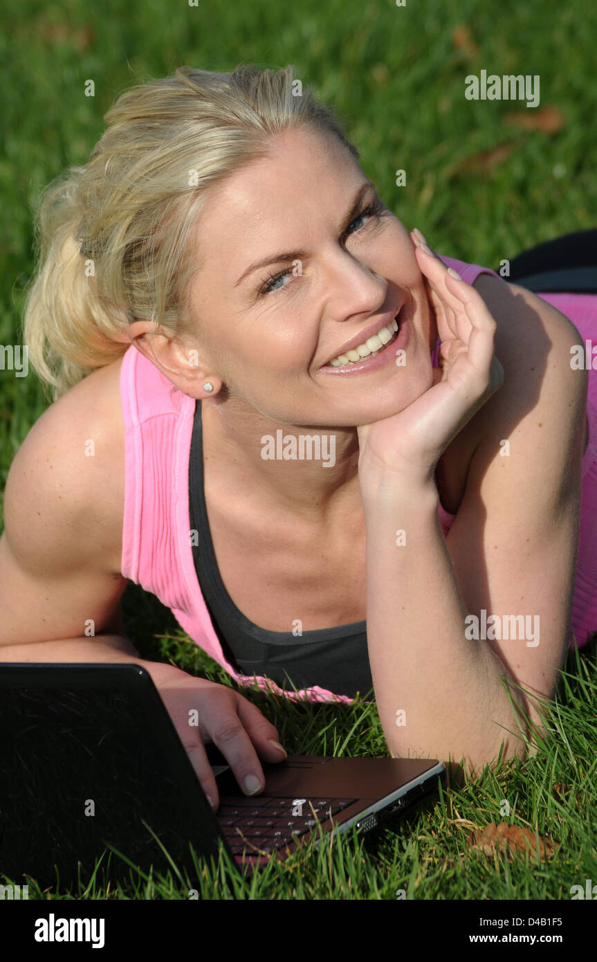 Woman using laptop hi-res stock photography and images - Alamy