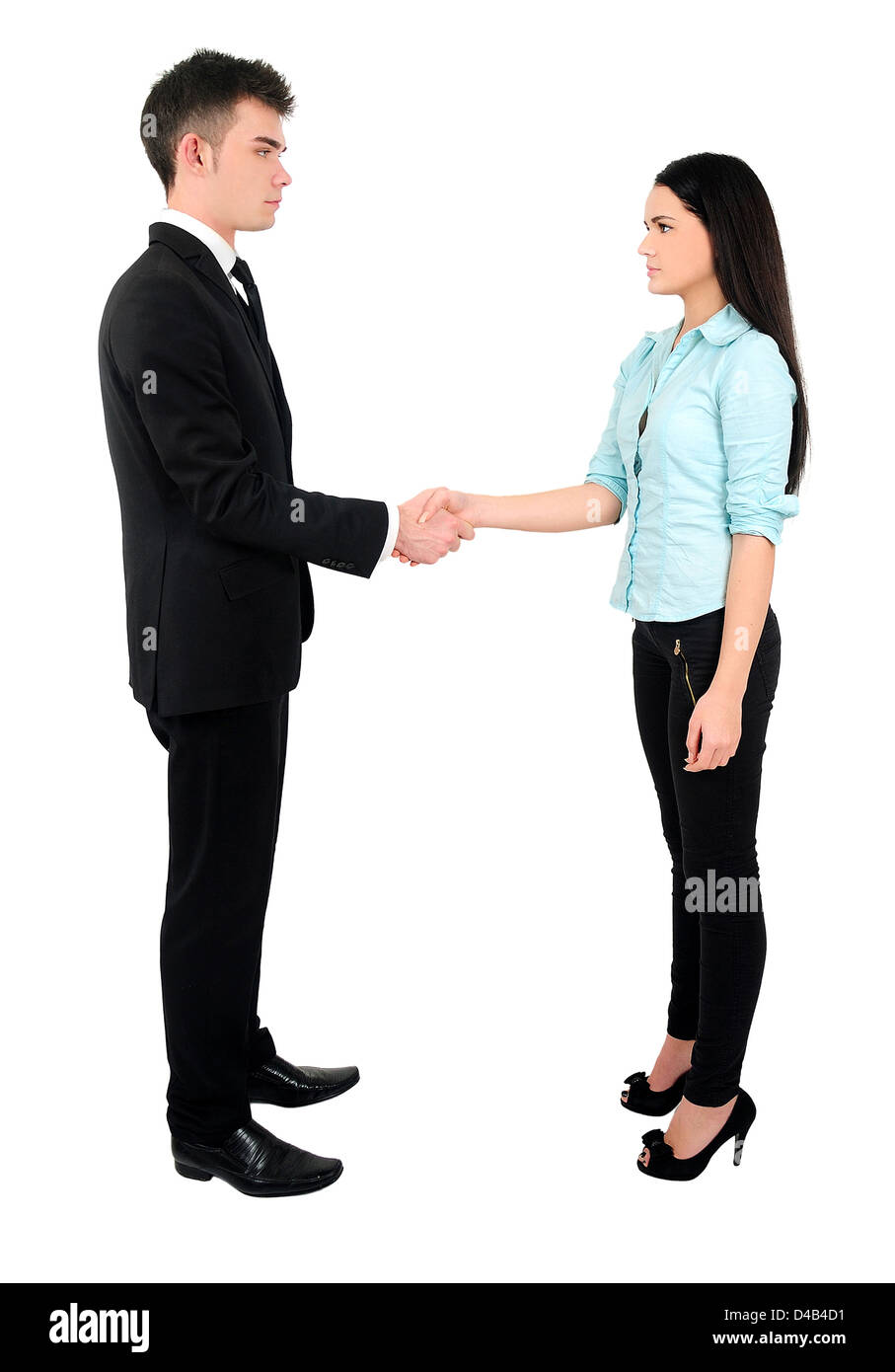 Isolated young business couple handshake Stock Photo