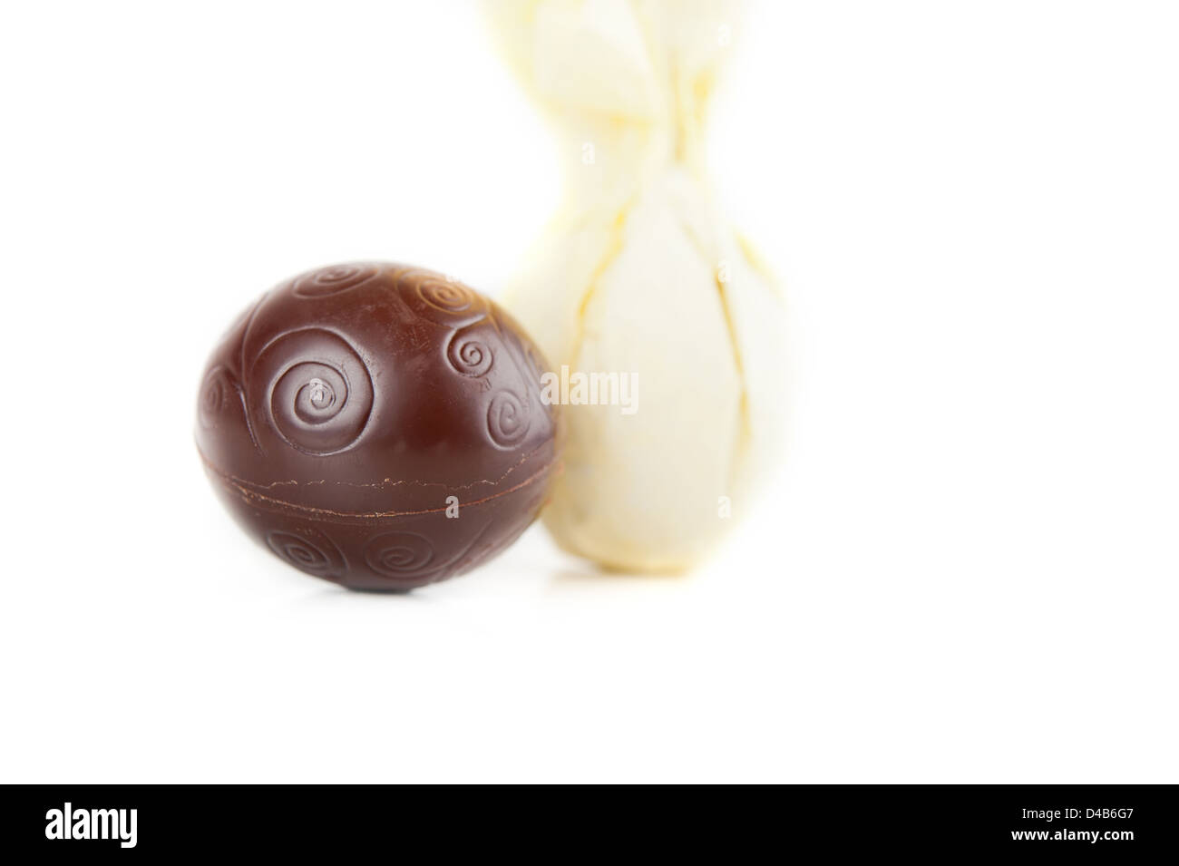 chocolate candy without the wrapper, near chocolate sweets on a white background Stock Photo Alamy