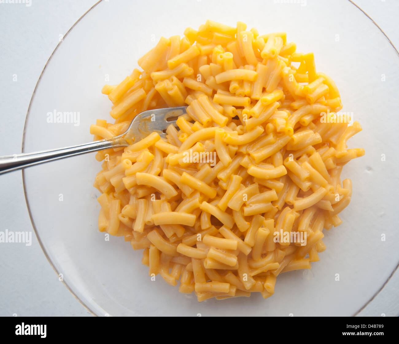 Macaroni and cheese (kraft dinner) on plate with fork Stock Photo Alamy
