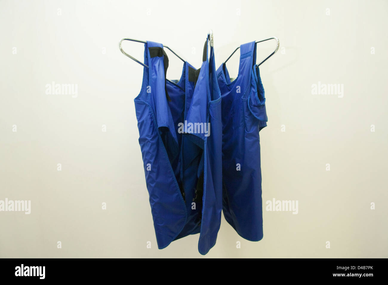 Lead aprons used by radiographers and patients in hospital xray