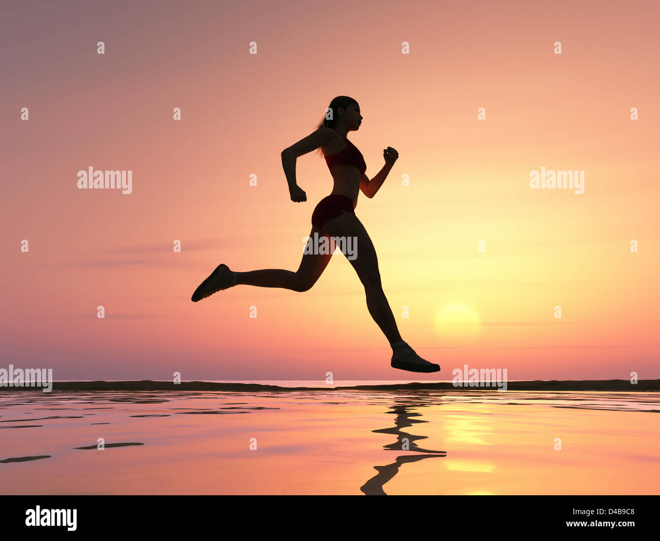 Woman running on the beach Stock Photo