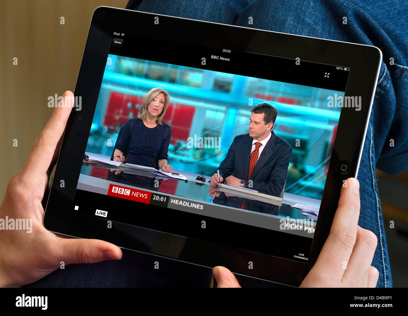 Watching the BBC News channel via the iPlayer on an Apple iPad Stock Photo