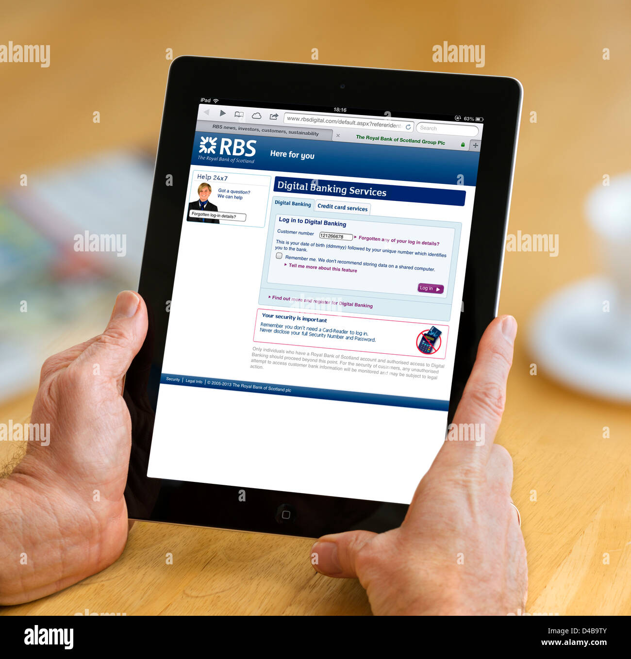 Logging onto an RBS Bank account on an iPad 4, UK Stock Photo