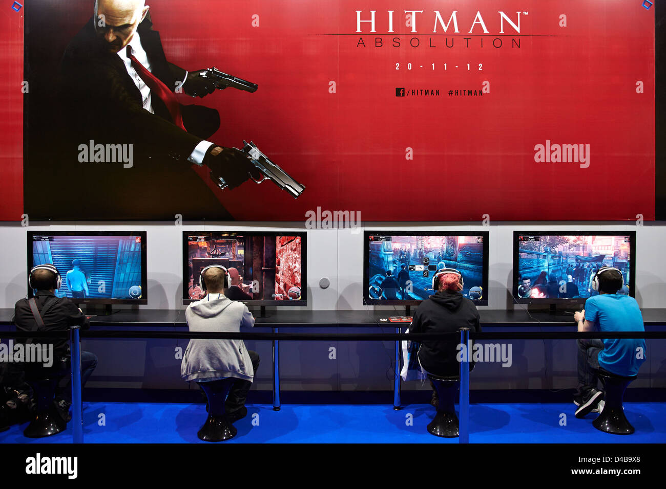 Visitors try out the unreleased Hitman Absolution computer game at the Eurogamer Expo in Earls Court London Stock Photo