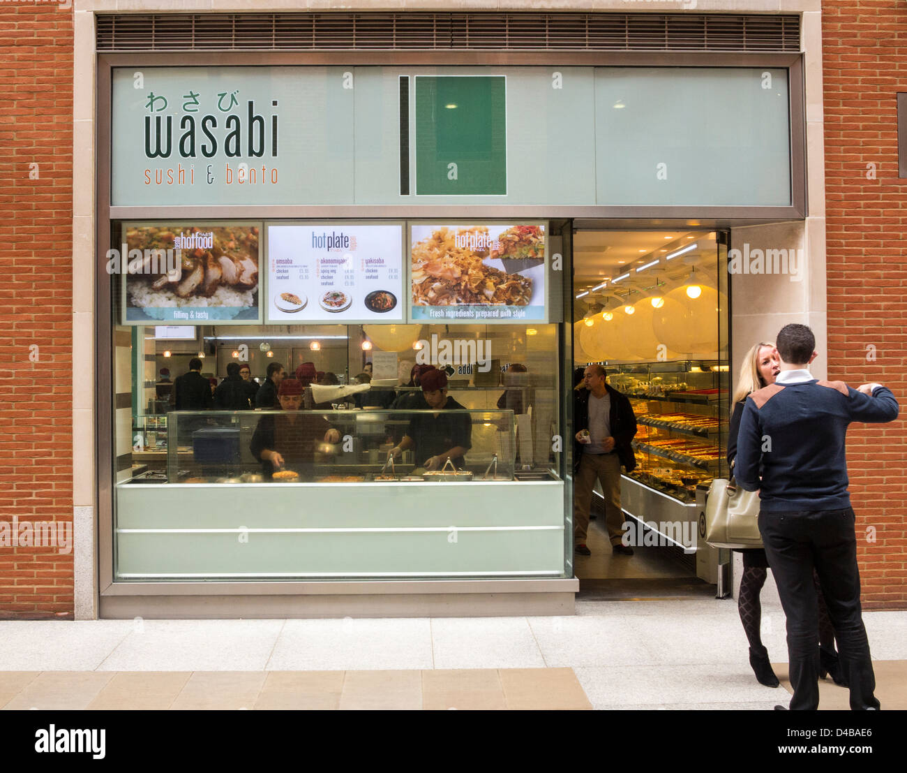 Wasabi sushi restaurant with people, London, England Stock Photo Alamy