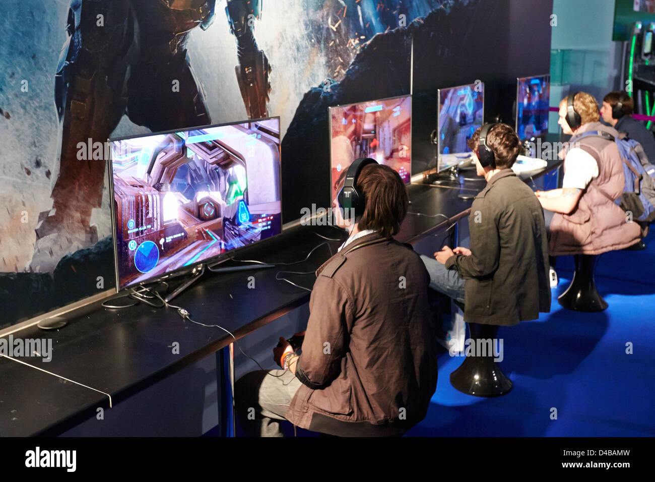 Visitors try out an unreleased computer game at the Eurogamer Expo in Earls Court London Stock Photo