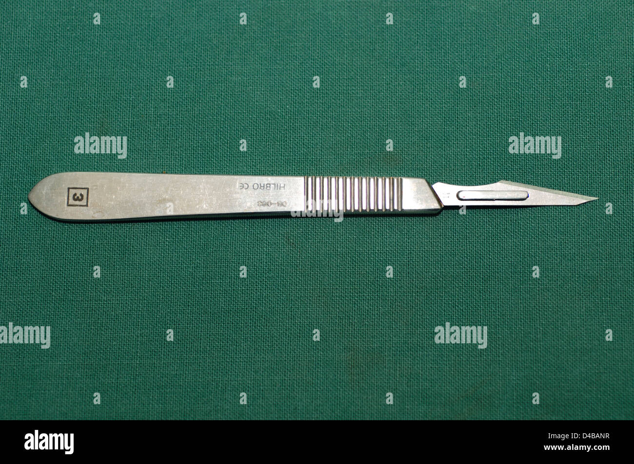 A No 3 surgical scalpel is a small but extremely sharp knife used for surgery and anatomical dissection. Stock Photo