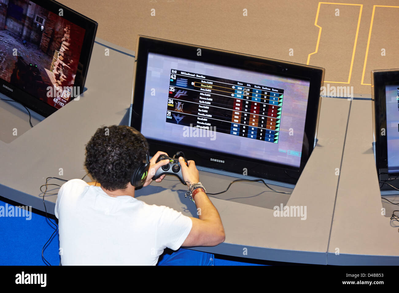 Visitors compete in a multiplayer tournament of the Call of Duty Black Ops 2 computer game at the Eurogamer Expo in Earls Court Stock Photo