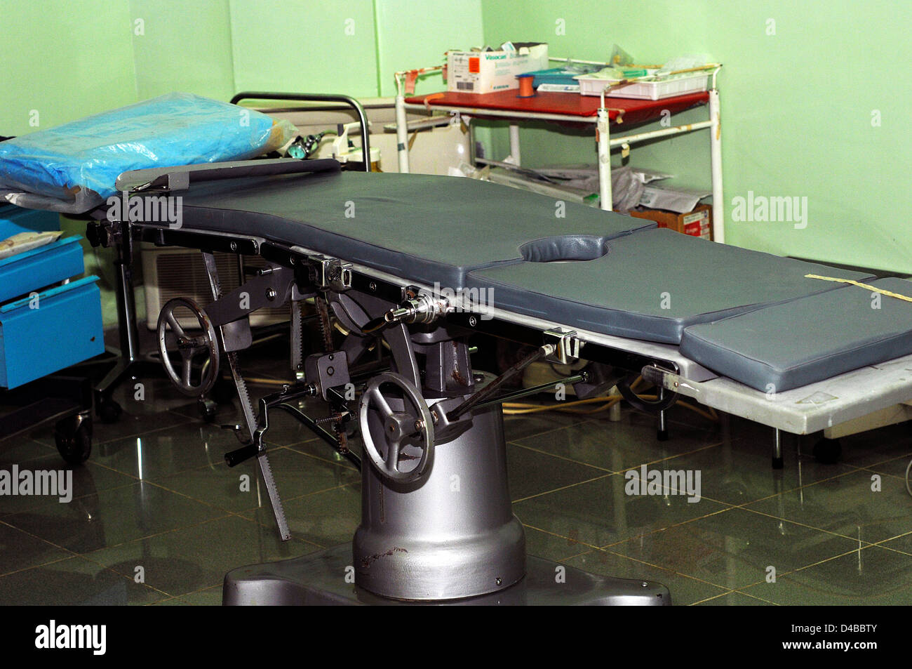 View operating theatre operating table surrounded medical equipment on