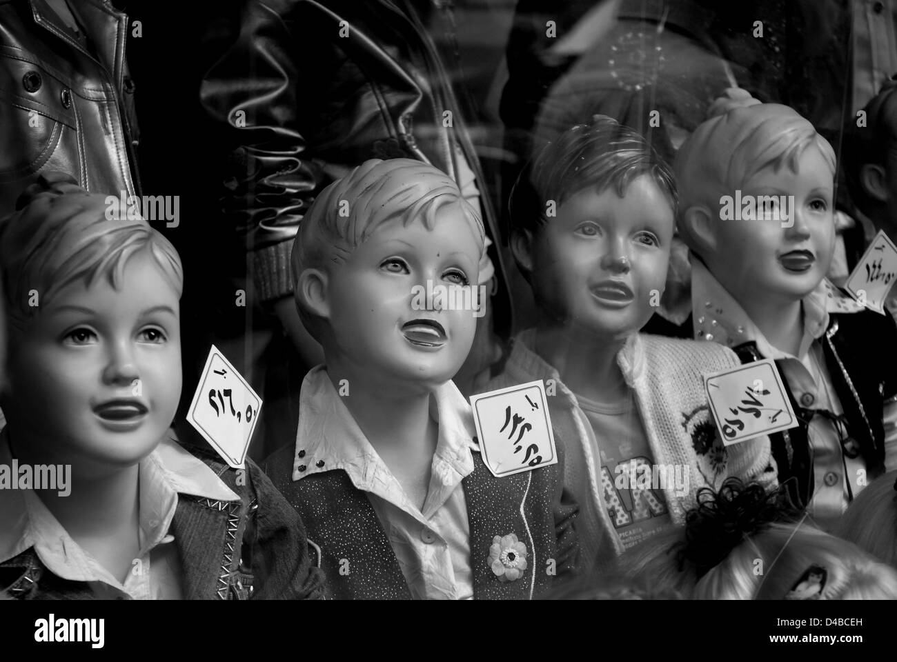 Child mannequins in shop window, Cairo Stock Photo