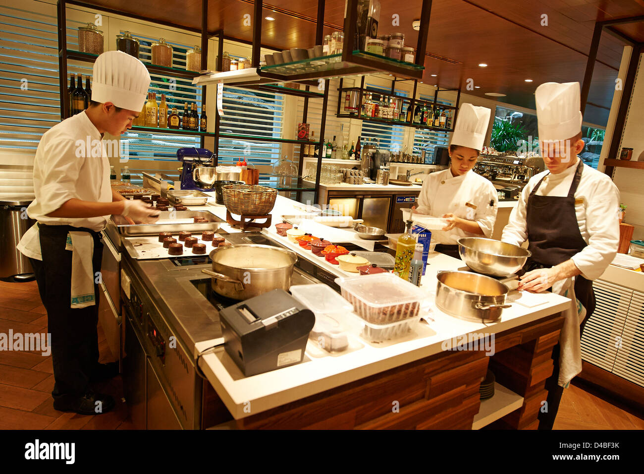 chefs in kitchen Stock Photo Alamy