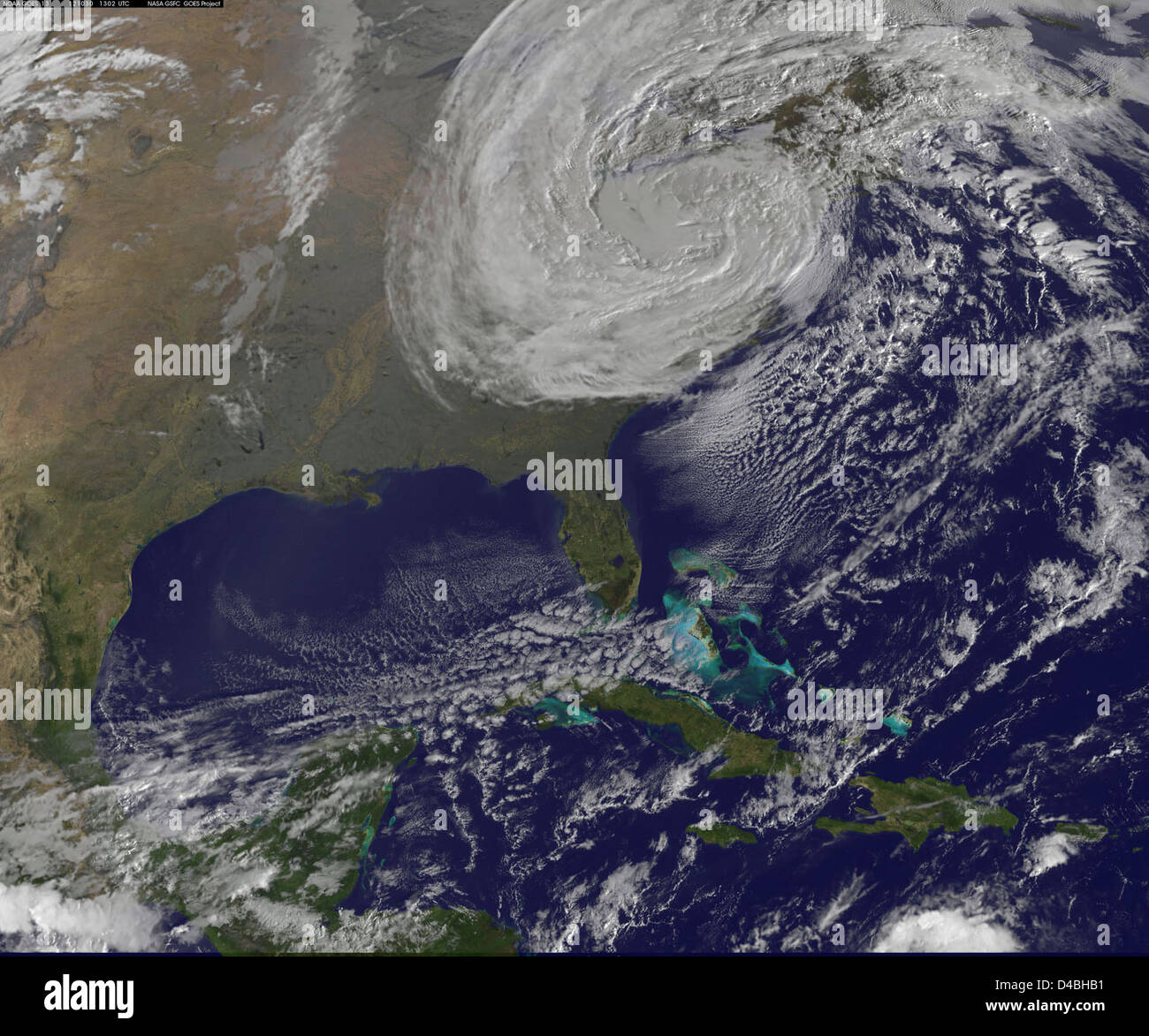 A satellite image shows the aftermath of Post-Tropical Cyclone Sandy on October 30, revealing the storm's path and impact on the Eastern U.S. The image was captured by NASA's Earth-observing satellites. Stock Photo