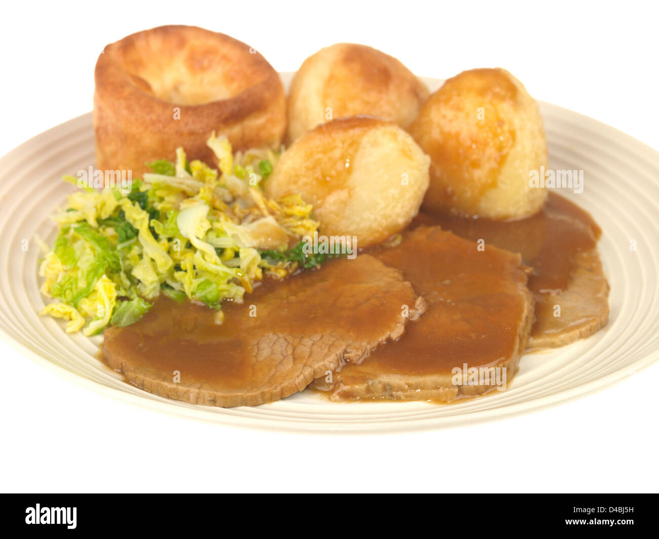 Traditional British Sunday Lunch, Roast Beef With Vegetables Gravy And Yorkshire Pudding