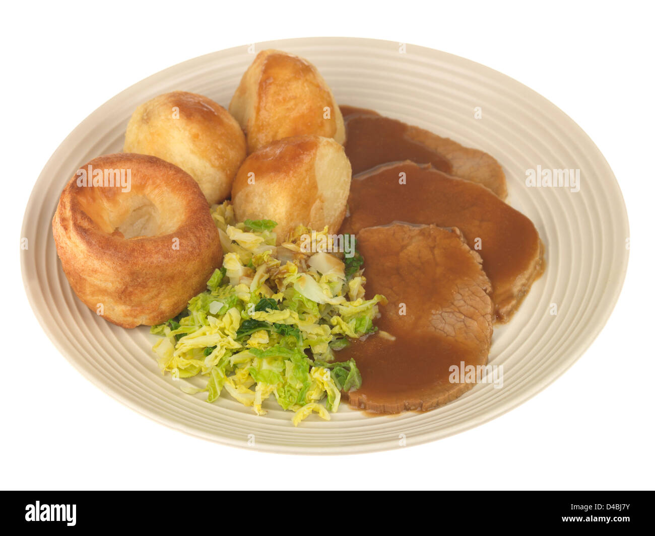 Traditional British Sunday Lunch, Roast Beef With Vegetables Gravy And Yorkshire Pudding