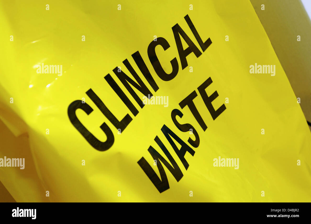 Close up of yellow clinical waste bag Stock Photo