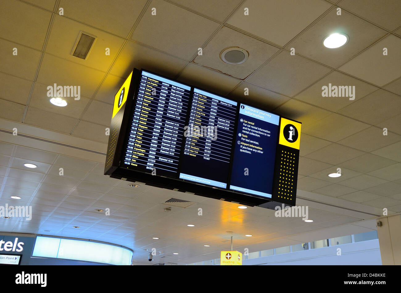 Flight arrival information Board in Terminal Three Heathrow Airport Stock Photo