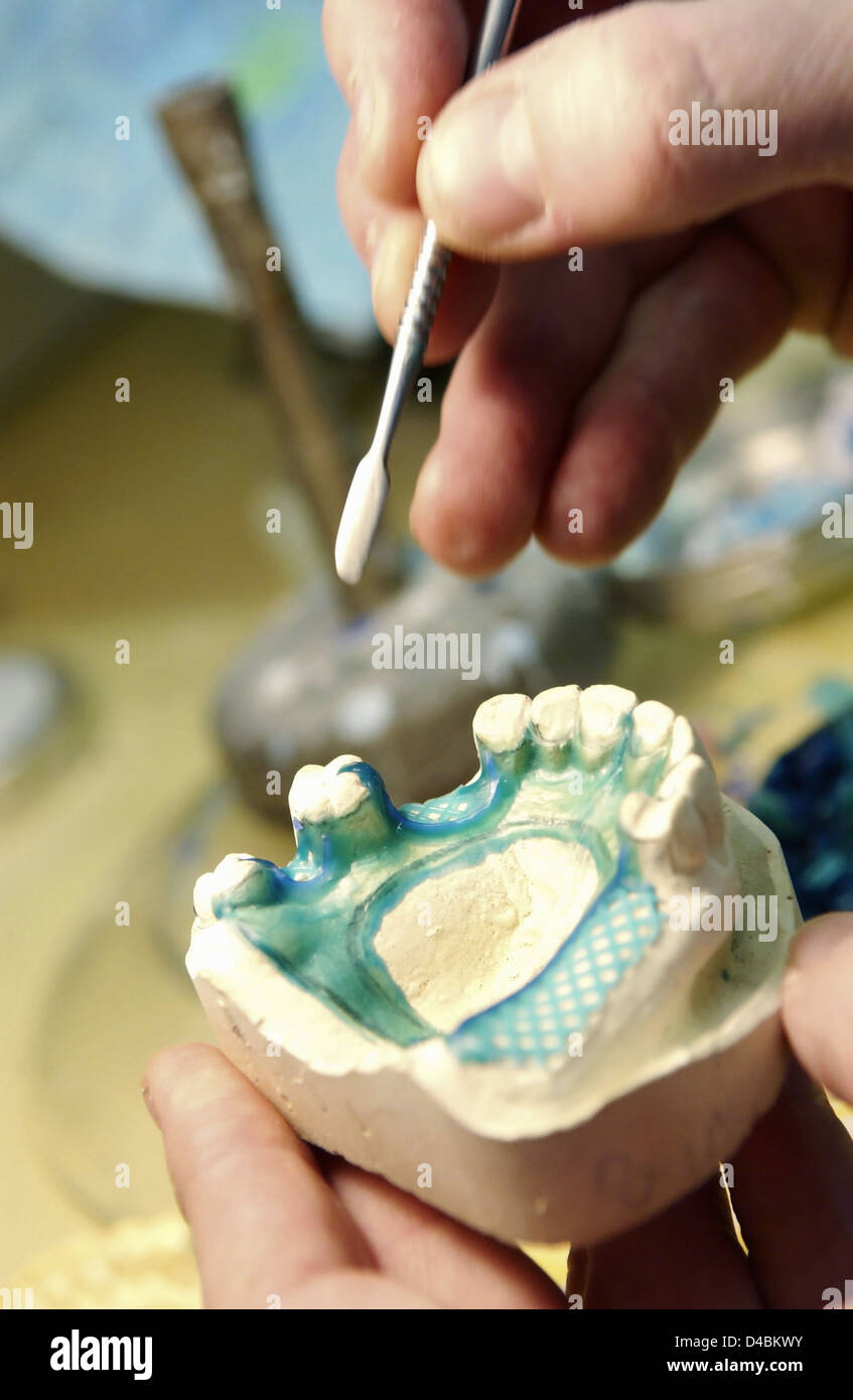 Preparation of dental cast with flux Stock Photo Alamy