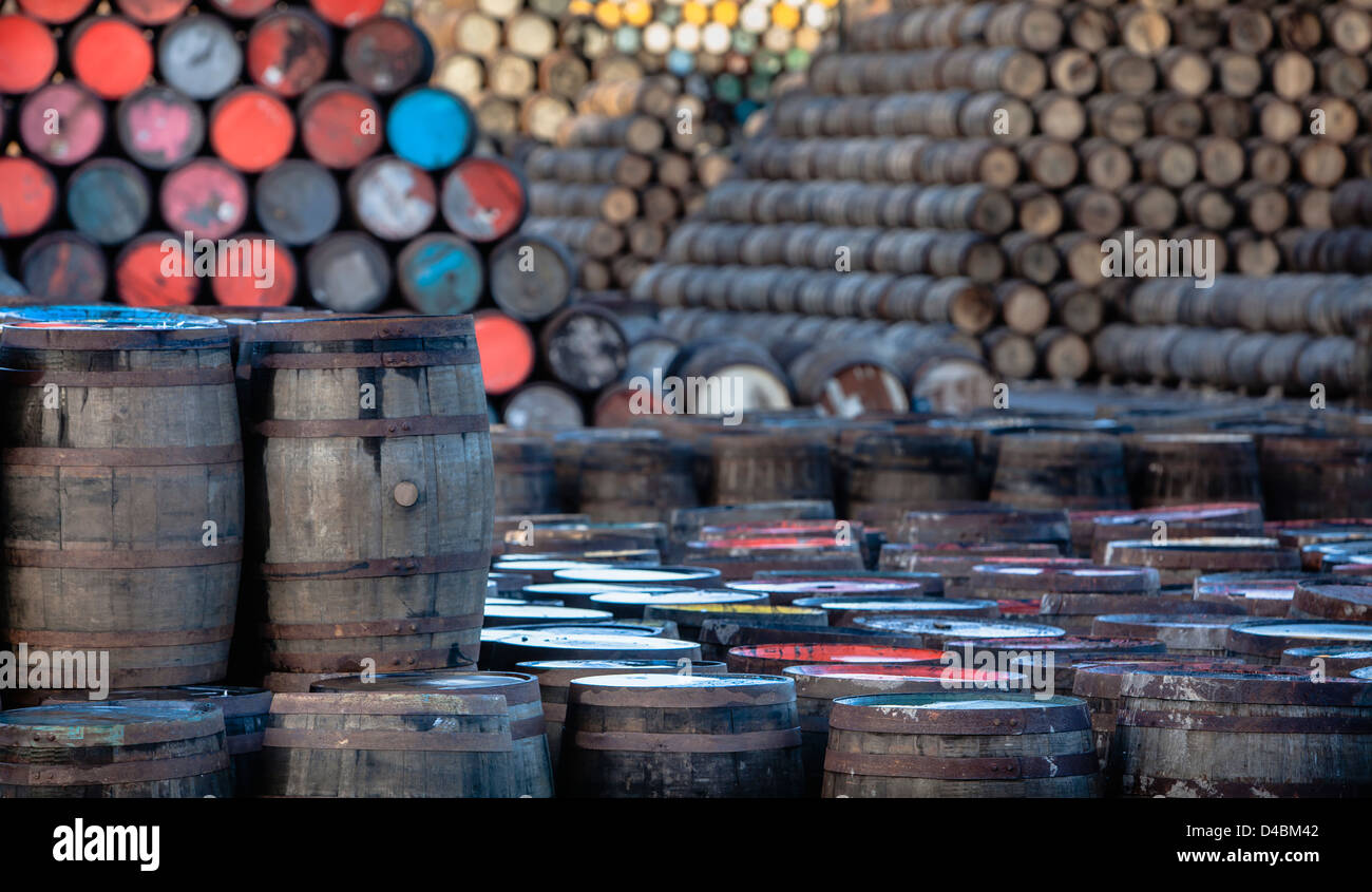 Stack of Oak Whisky barrels on Speyside in Scotland. Stock Photo