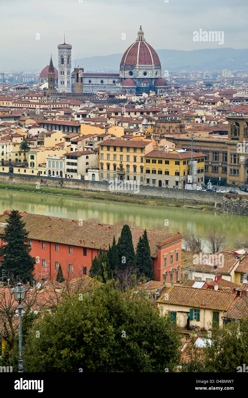 View across the rooftops and River Arno towards the Duomo, from the Piazza Michelangelo, Florence, Italy. Stock Photo