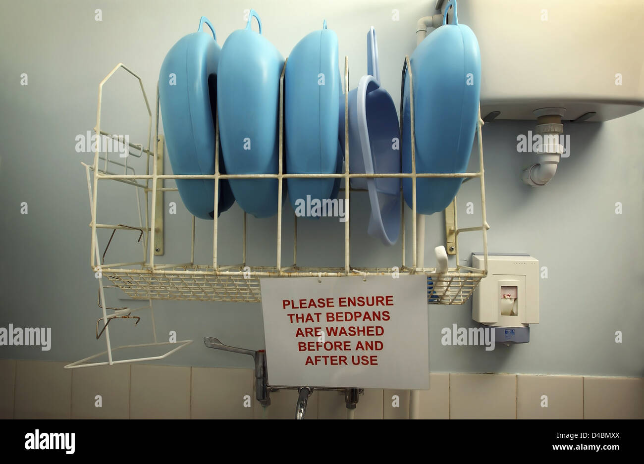 Bedpans in storage in sluice room hi-res stock photography and images ...