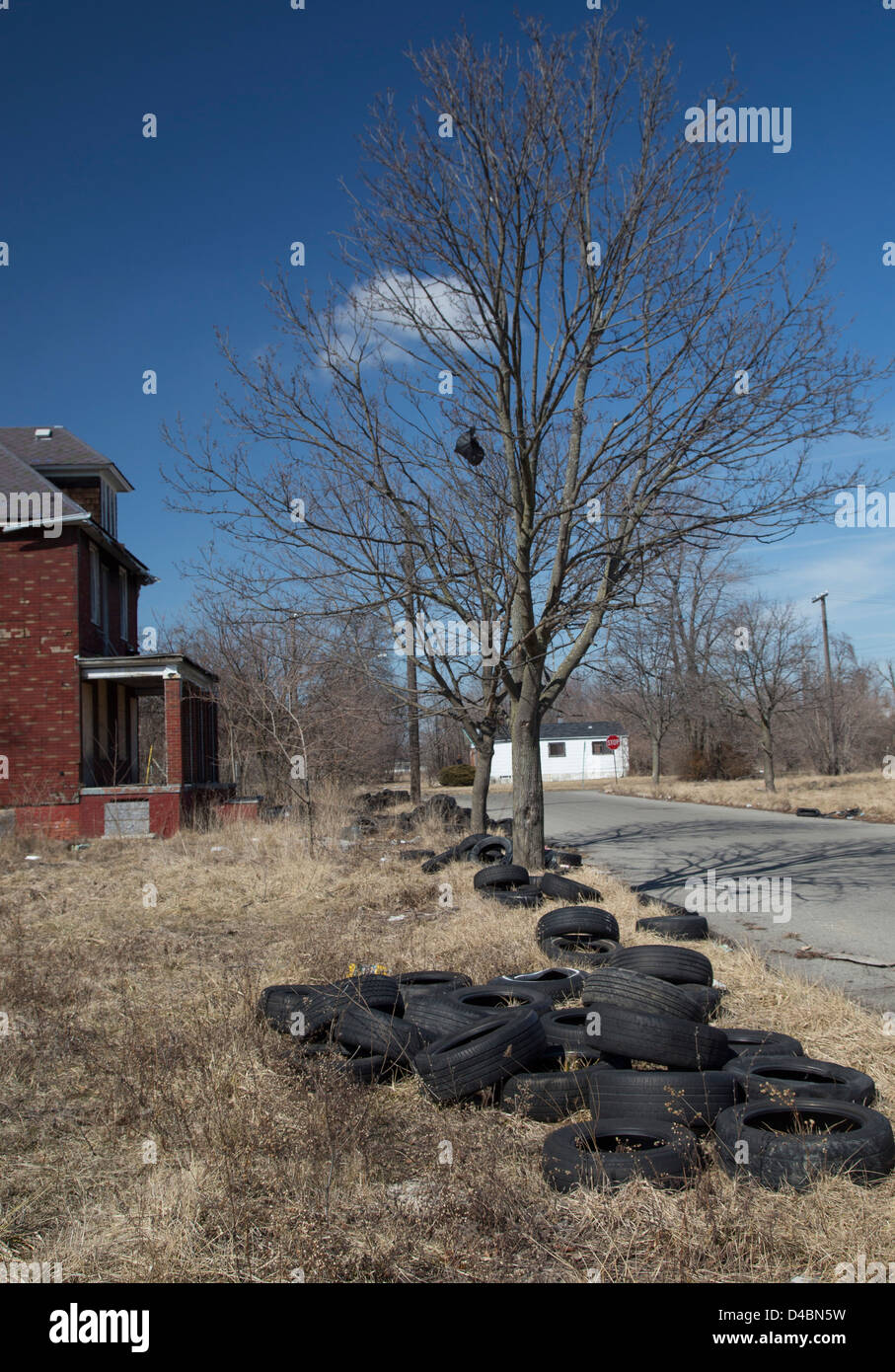 Detroit, Michigan Used tires dumped on a street in a poor