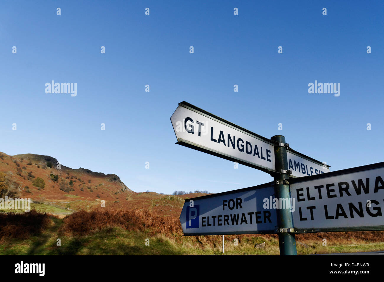 Road signs for Ambleside and Great Langdale in the Lake District Stock