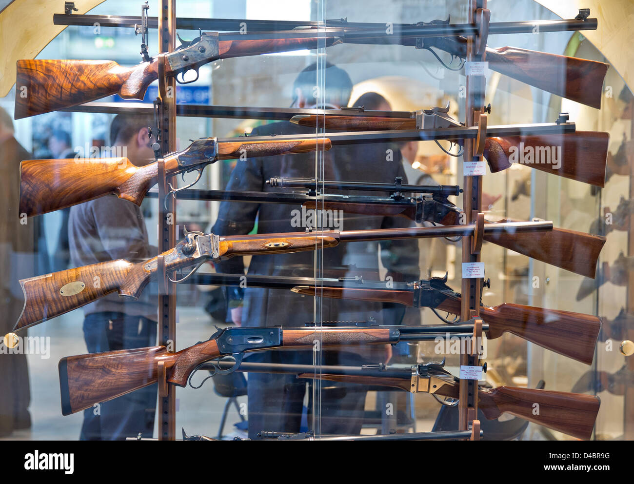 Sporting guns and rifles are on display at the   IWA & OutdoorClassics sport hunting fair in Nuremberg, Germany, 8 March 2013. Photo: Daniel Karmann Stock Photo