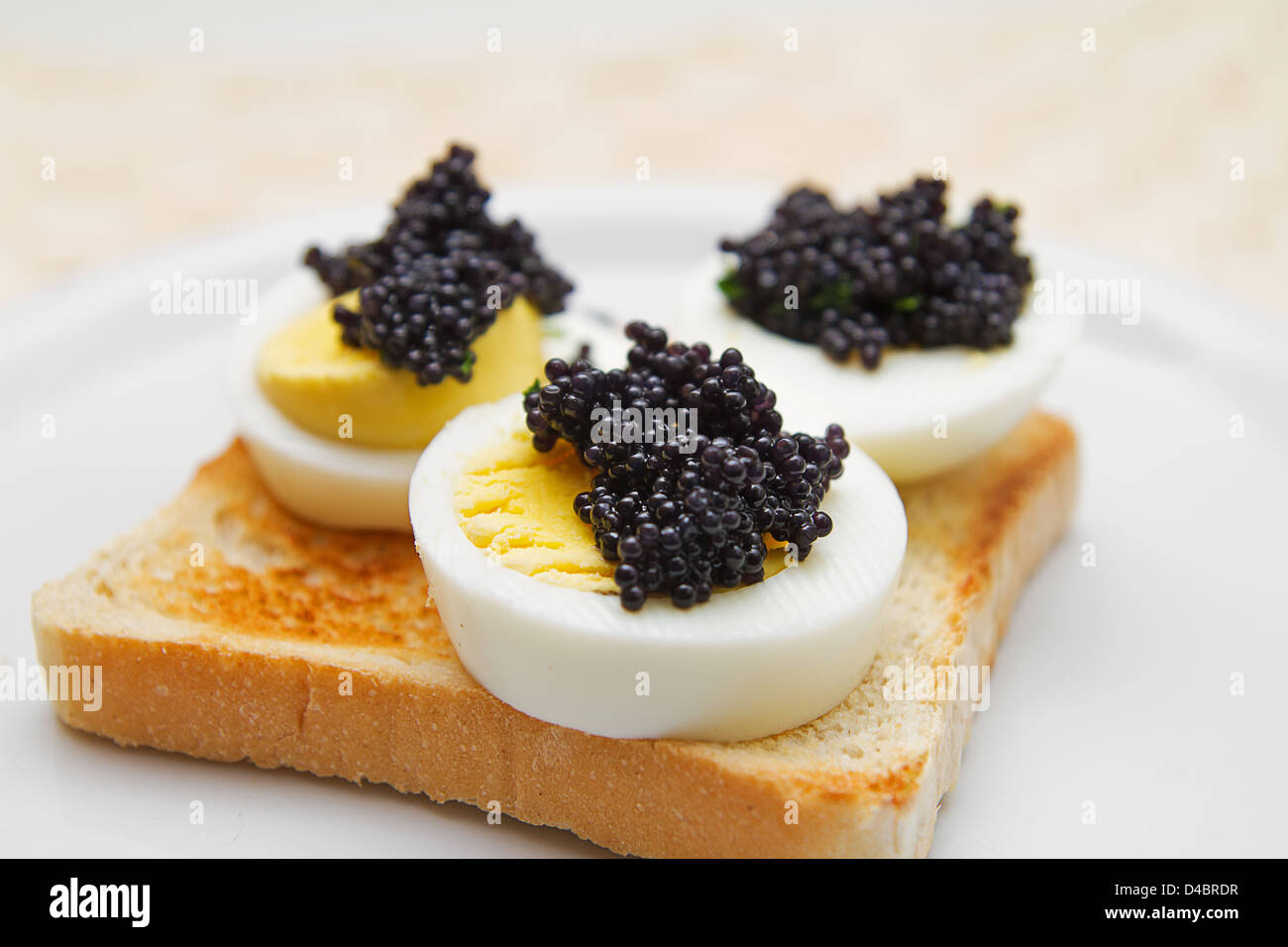 Caviar with toast and eggs Stock Photo Alamy