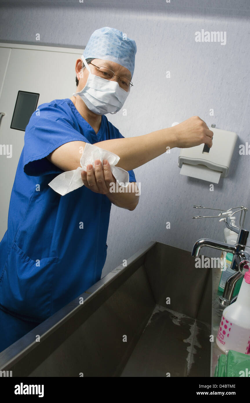 Surgeon washing hands before surgery Stock Photo Alamy
