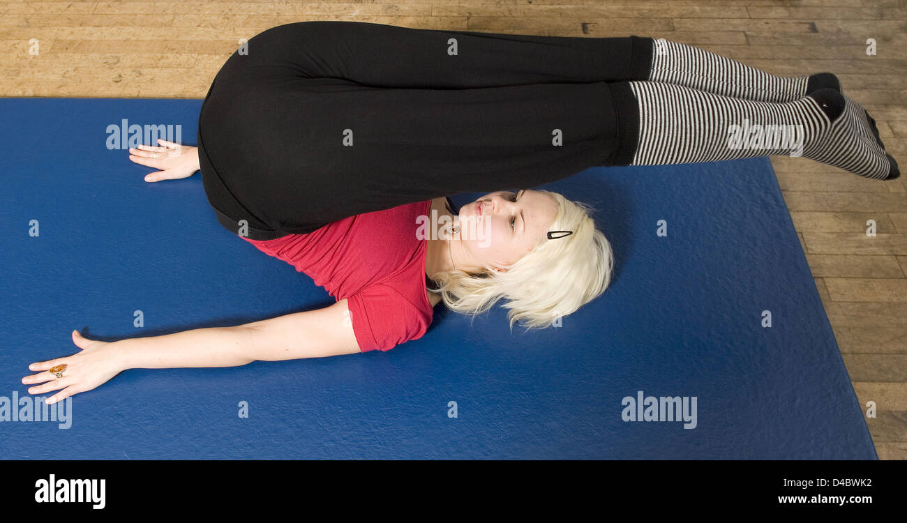 An exercise class Body Control Centre in London practice Pilates Roll