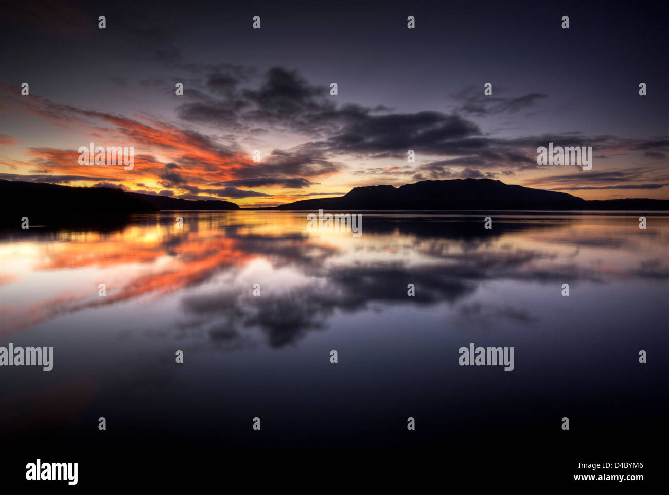 Sunrise with Mount Tarawera reflected in Lake Tarawera, Rotorua, New ...