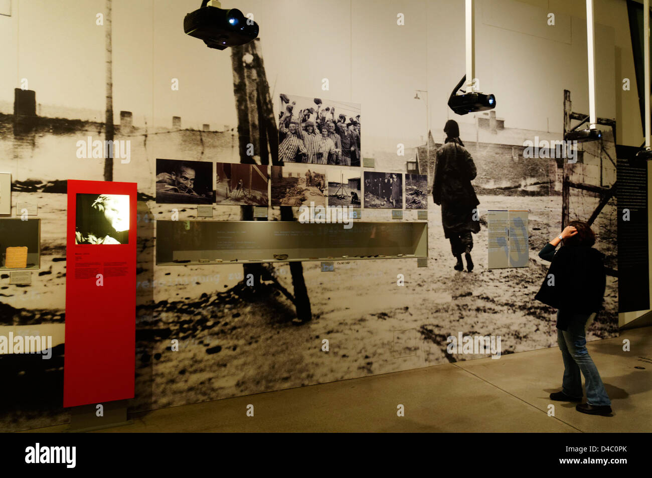 A woman looking at a concentration camp display in the Jewish Museum in Berlin Stock Photo
