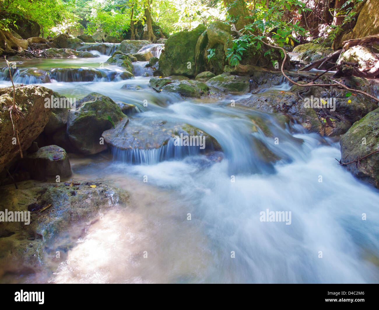Waterfall in deep forest Stock Photo - Alamy