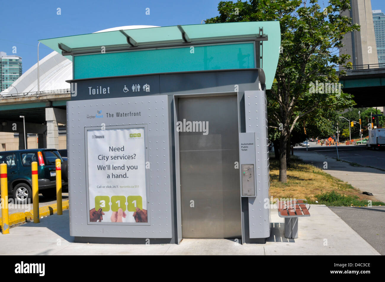 Pay toilet bathroom washroom downtown Toronto Ontario Canada Stock
