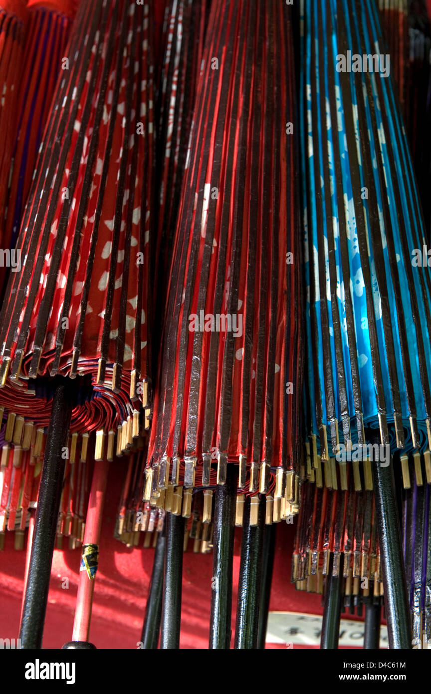 Pattern of red and blue traditional Japanese paper bangasa umbrellas. Stock Photo