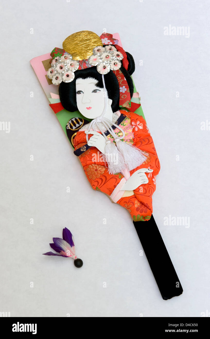 Traditional decorated hagoita wooden paddle used to play a game called hanetsuki, a kind of Japanese badminton or battledore. Stock Photo