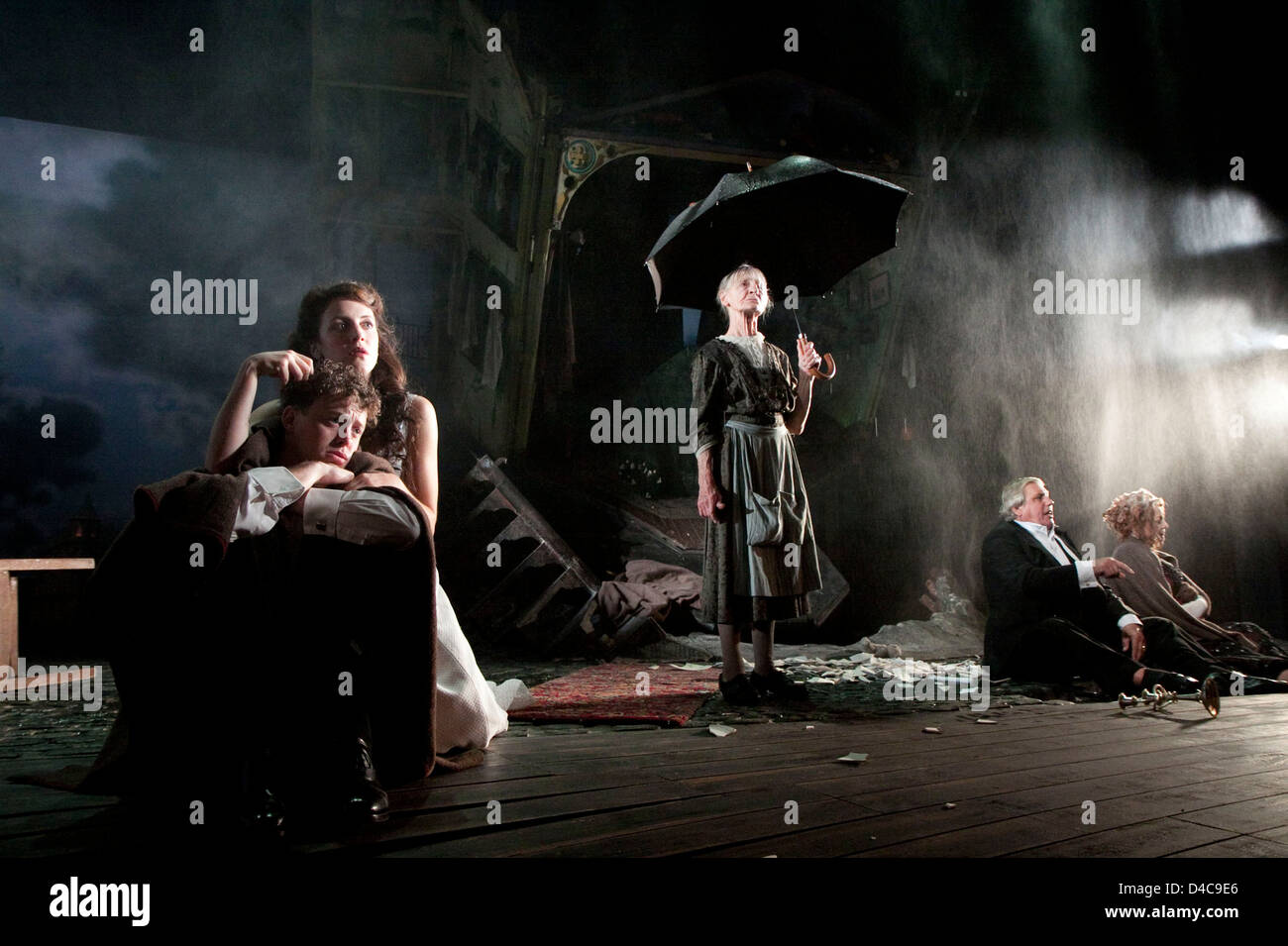 l-r: Robin Whiting (Eric Birling), Marianne Oldham (Sheila Birling), Diana Payne-Myers (Edna), David Roper (Arthur Birling), Sandra Duncan (Sybil Birling) in AN INSPECTOR CALLS by J B Priestley at the Novello Theatre, London WC2 25/09/2009 a National Theatre production  design: Ian MacNeil   lighting: Rick Fisher   director: Stephen Daldry Stock Photo