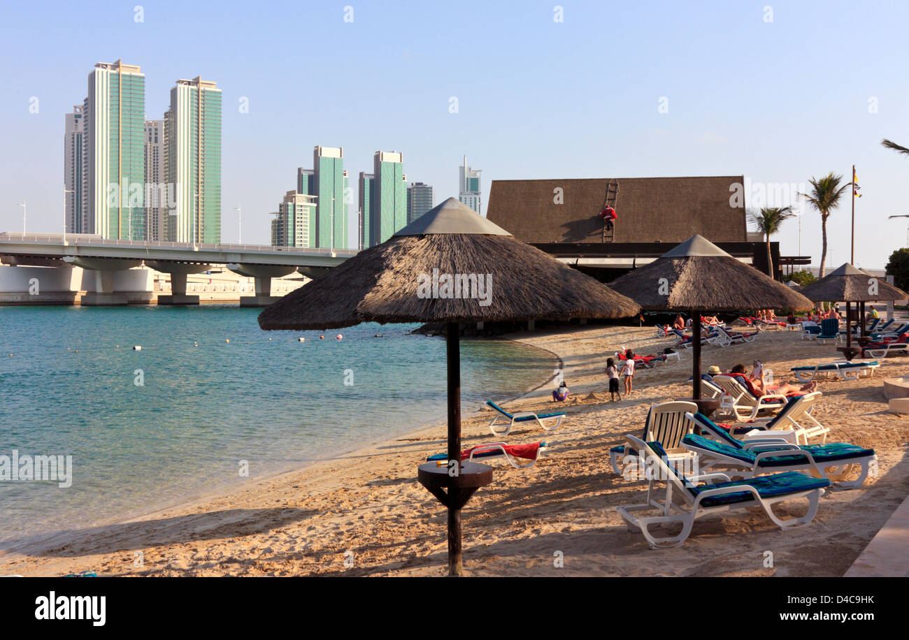 Private Hotel Beach with view towards Reem Island, Abu Dhabi, United Arab Emirates Stock Photo