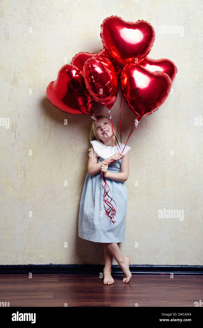 Girl in dress with air balloons Stock Photo