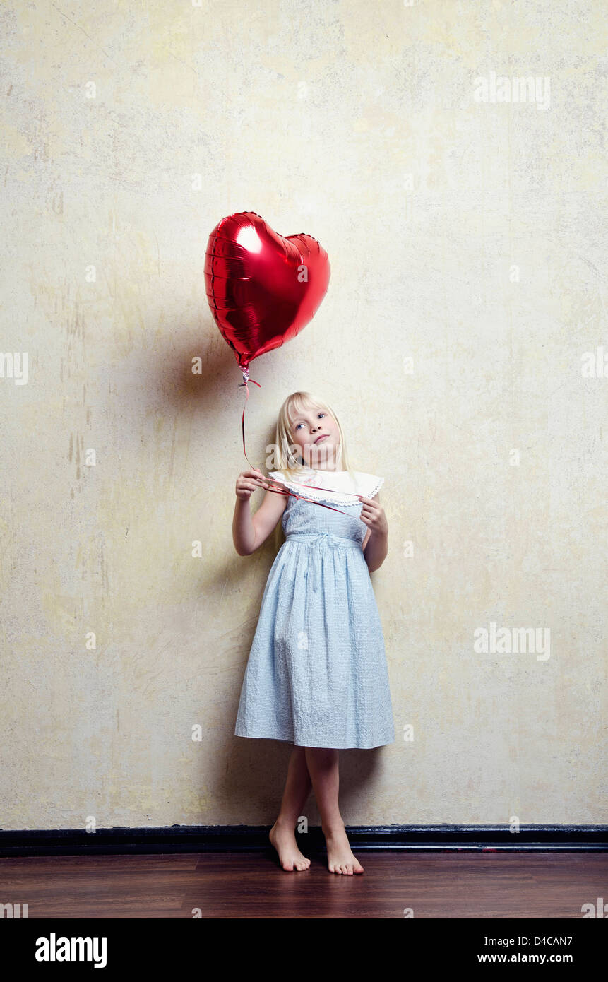 Girl in dress with air balloon Stock Photo
