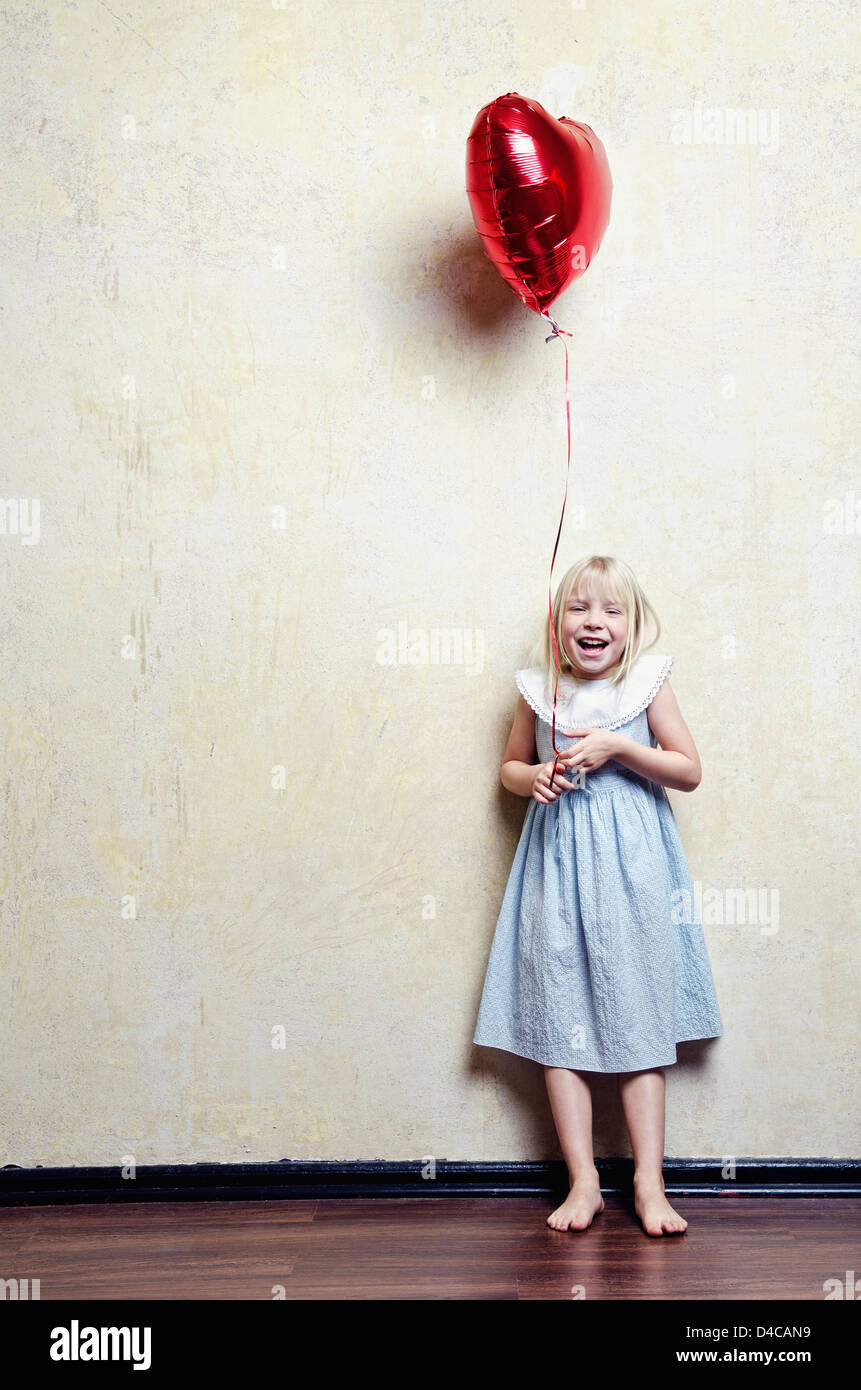 Girl in dress with air balloon Stock Photo