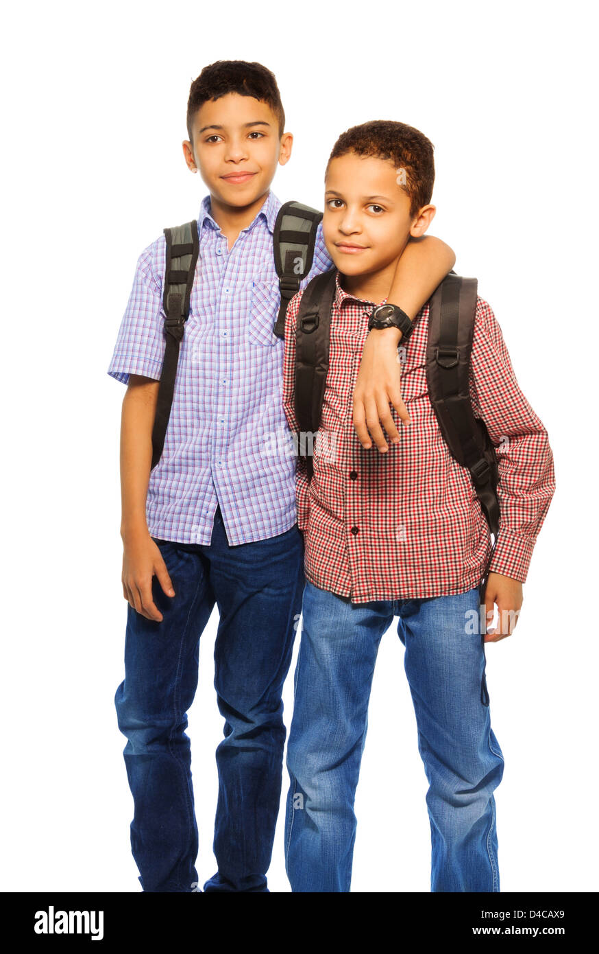 Two Happy Black Brothers Standing Together With Backpack Hugging