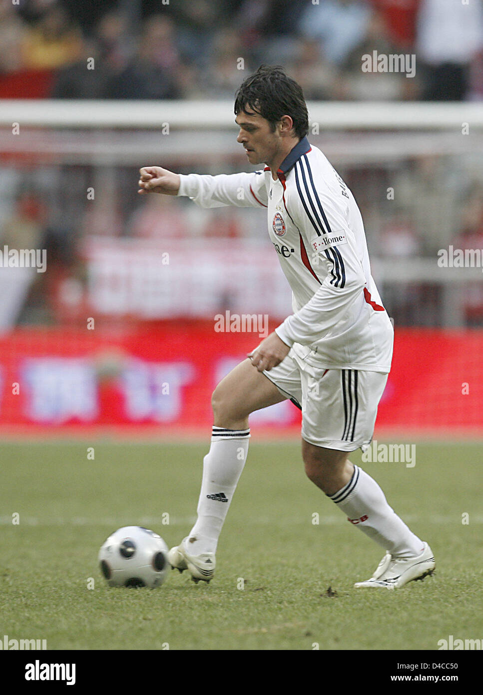 Bayern Munich's Willy Sagnol (R) and 1860 Munich's Lars Bender (L) shown in  action during the soccer friendly FC Bayern Munich vs TSV 1860 Munich at  Allianz-Arena in Munich, Germany, 26 January